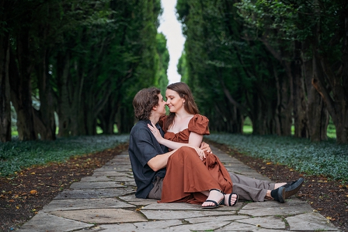  couple sitting together at botanical gardens