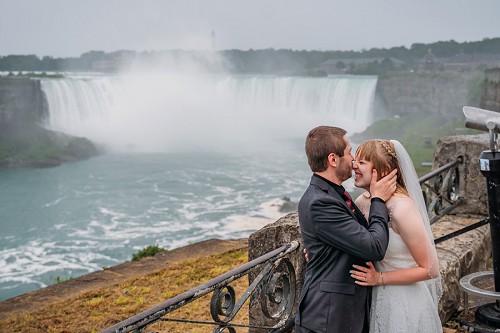 groom kissing brides nose