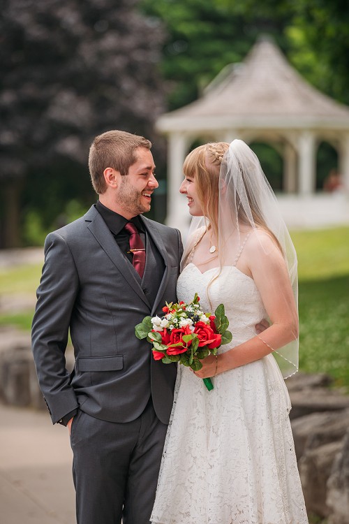 bride and groom smiling