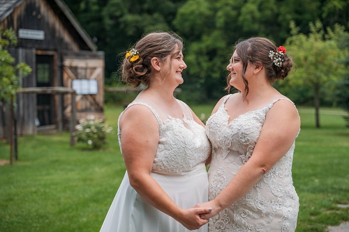 brides looking at each other