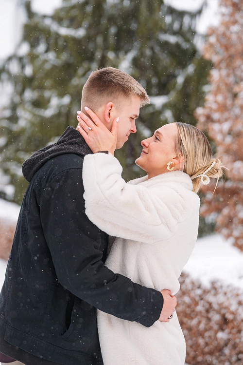  couple kissing after proposal