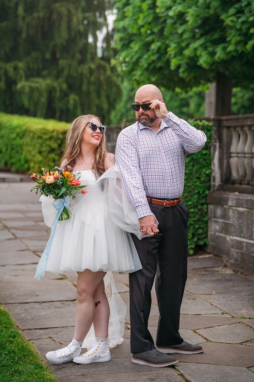 bride and groom with sunglasses