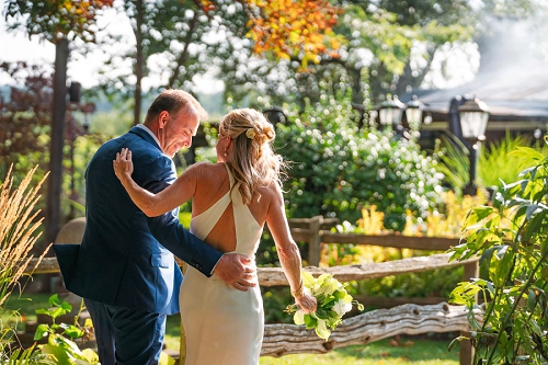  candid of bride and groom at Honsberger Estate Winery just after getting married