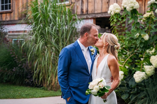 bride and groom kissing 