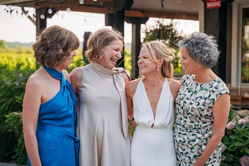  bride and friends laughing