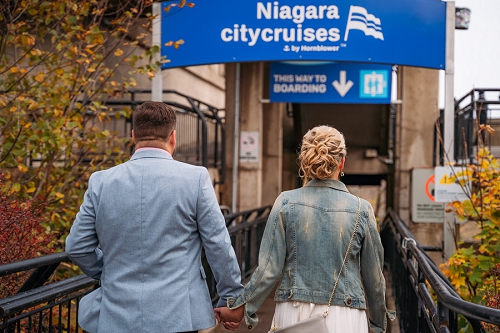 bride and groom getting on Hornblower Niagara cruise 