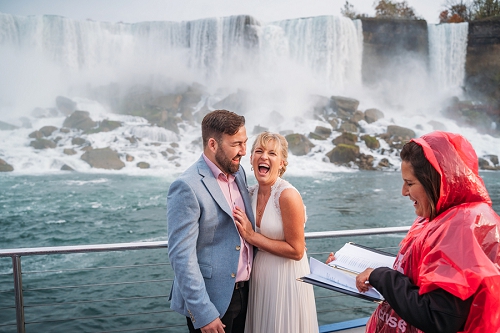  couple laughing during elopement ceremony on hornblower