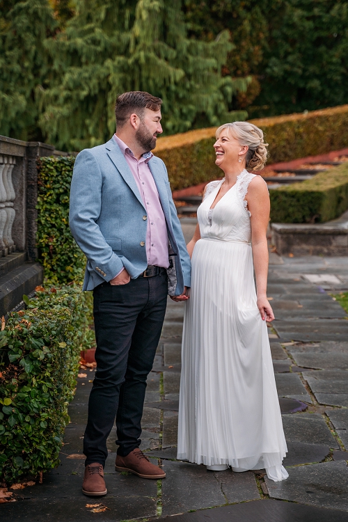 Bride and groom smiling 