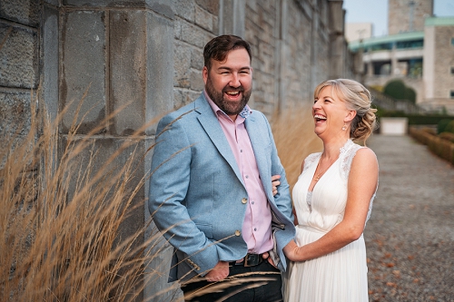  candid of bride and groom laughing at Oakes Garden Theatre