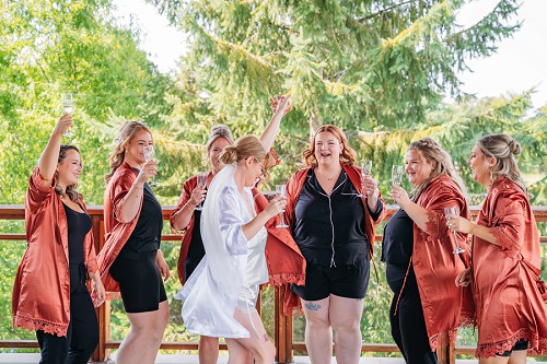 bridesmaids dancing and laughing 