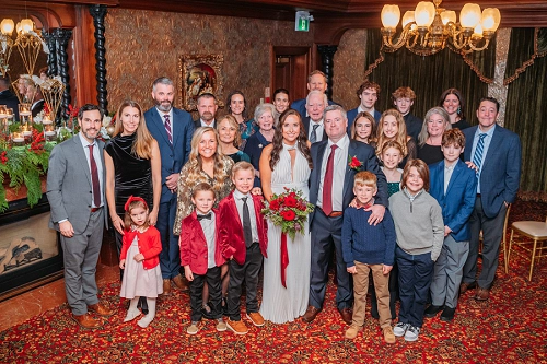  bride and groom with all of their guests