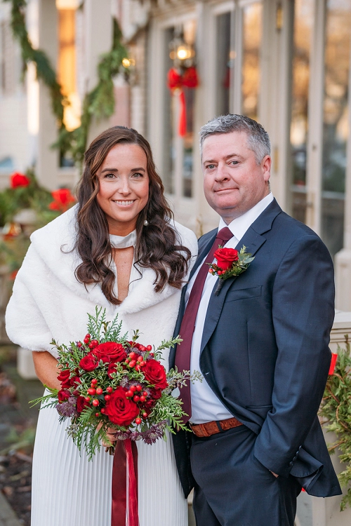  bride and groom in front of prince of wales hotel in niagara on the lake