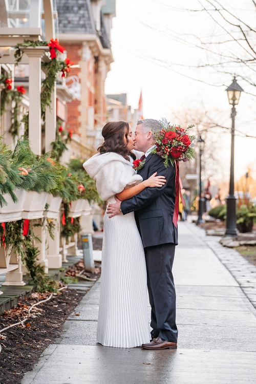  bride and groom kissing in front of prince of wales hotel