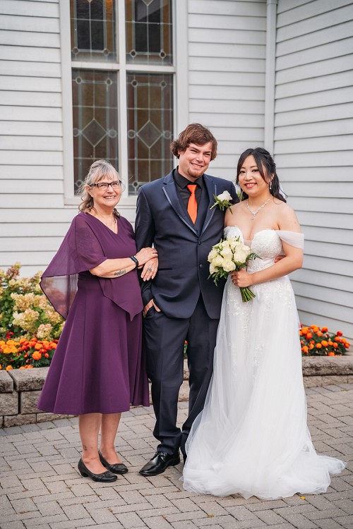 bride and groom with mom