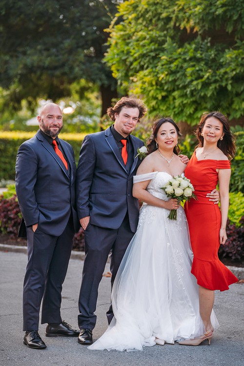 portrait of wedding party at botanical garden