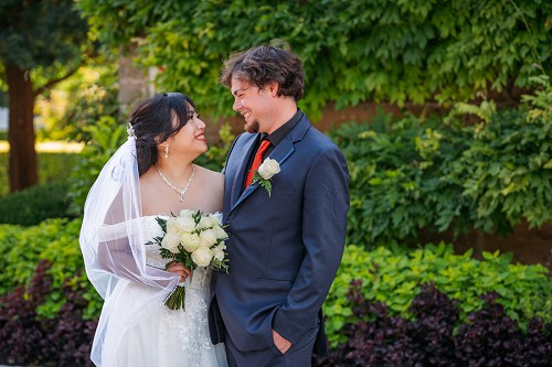 bride and groom looking at each other