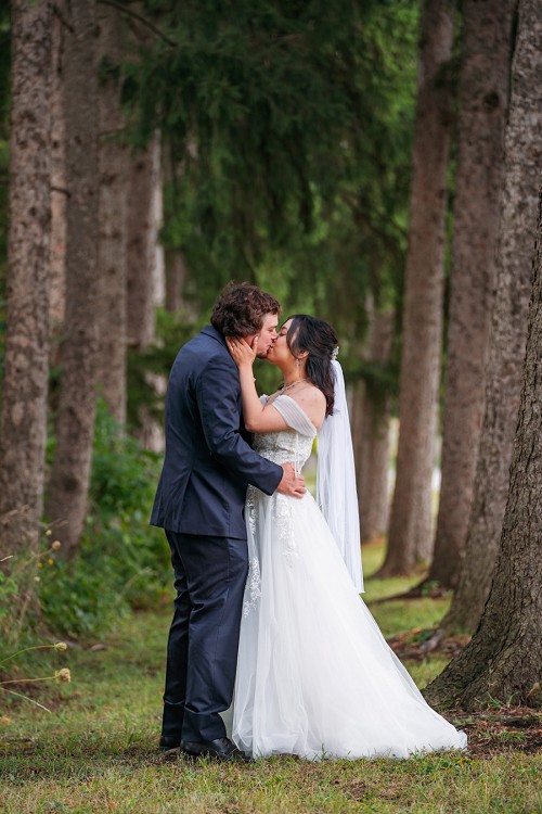 bride and groom kissing