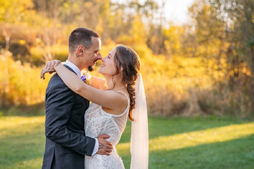  groom holding bride