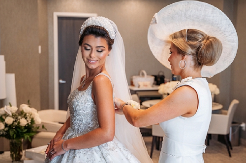  mom helping bride get ready