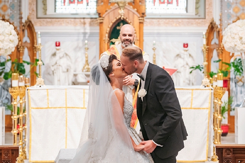  bride and groom first kiss