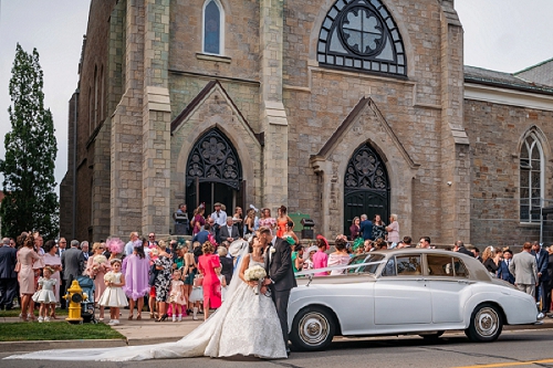 vintage Bentley with bride and groom in niagara 