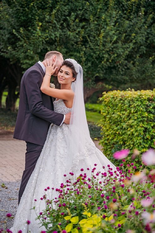 groom whispering to bride 