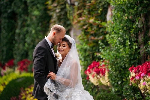 bride and groom embracing 