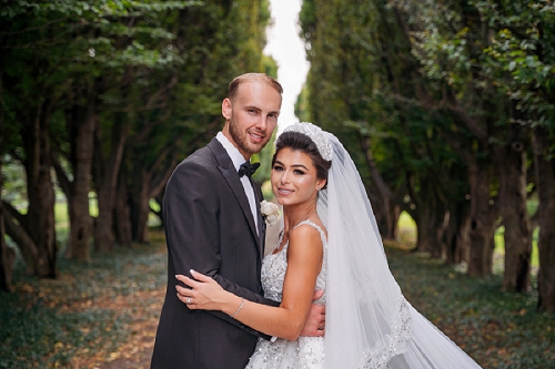  portrait of bride and groom smiling at camera