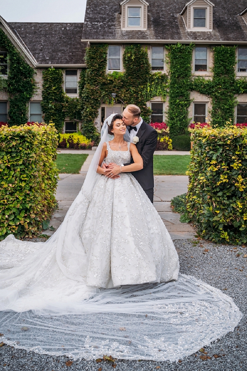  groom holding bride